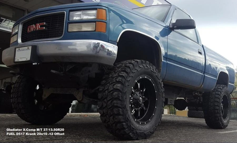 Blue GMC lifted pickup at Tire Capital in Prince George