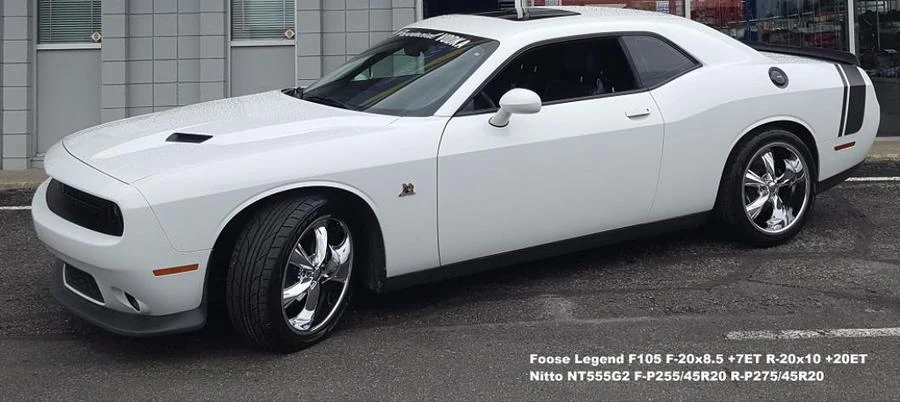 White two-door coupe at Tire Capital in Prince George