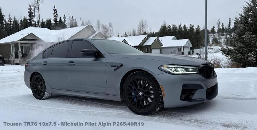 Grey BMW sedan in the snow at Tire Capital in Prince George. Fitted: Touren TR76 19x7.5 - Michelin Pilot Alpin P265/40R19